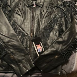 New with tags. Leather. Xl Never worn.